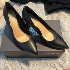 Pointed black heels